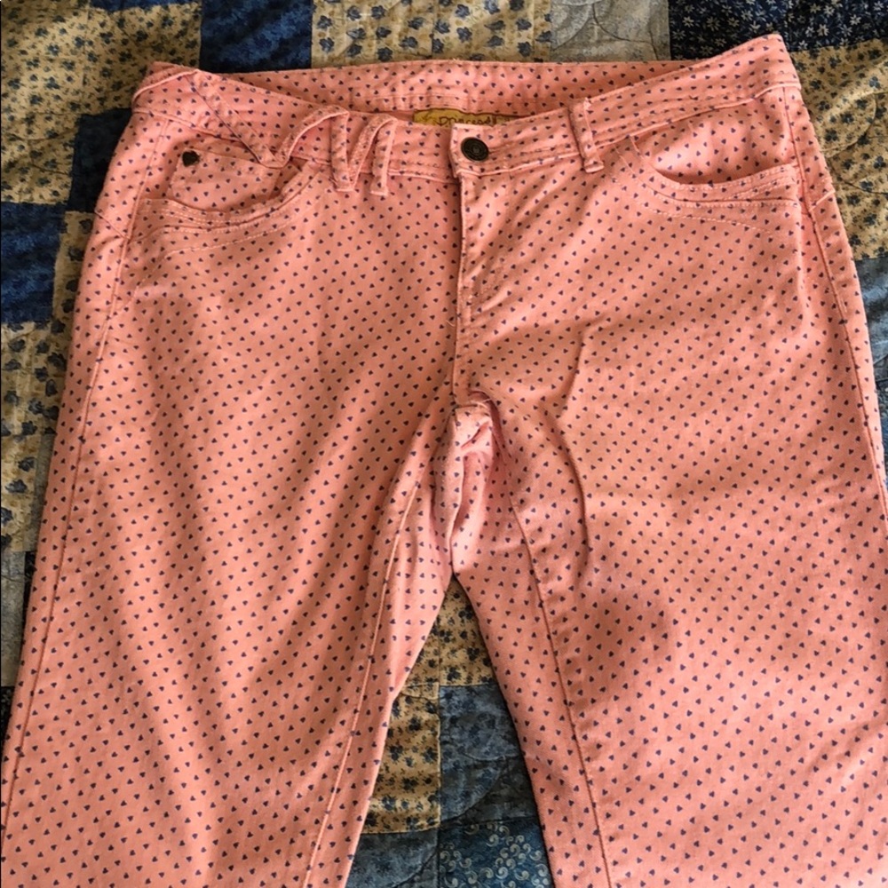 Pink jeans with blue hearts